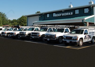 RoofWorks of Virginia building and trucks